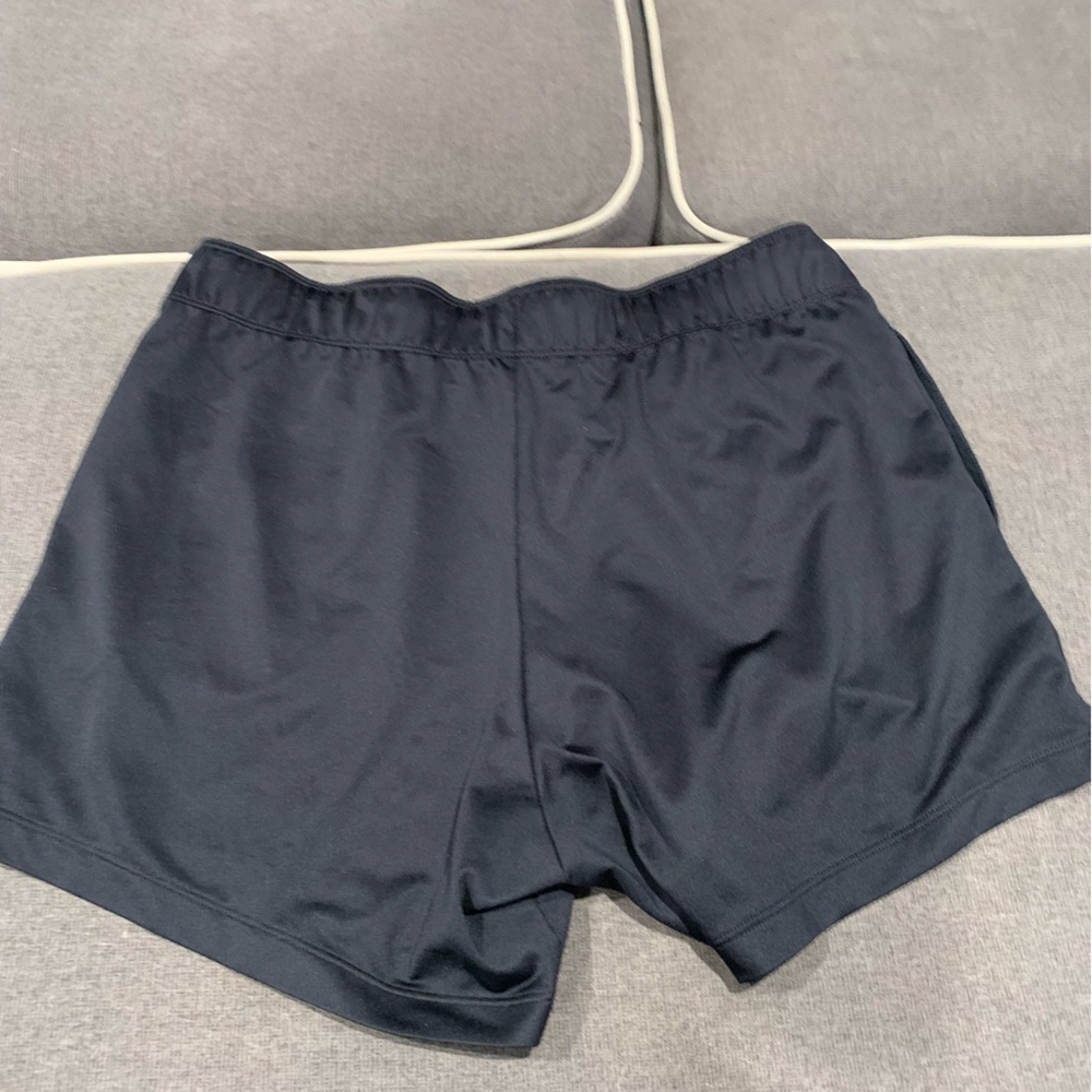 Black Nike running shorts